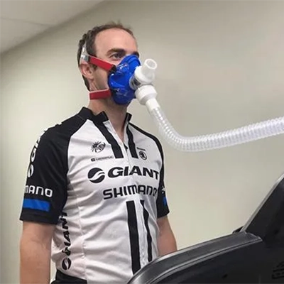 Man Doing VO2 Testing On A Treadmill With Oxygen Mask