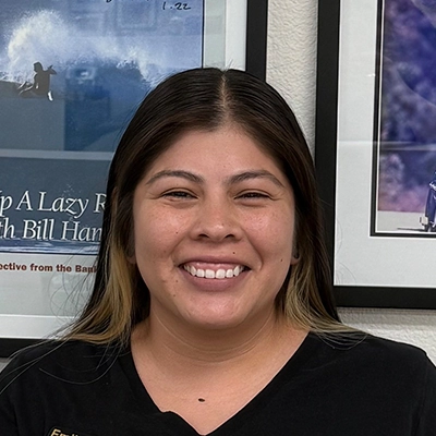 Rehabilitation Aide Emily Ortega Smiling In Black Shirt
