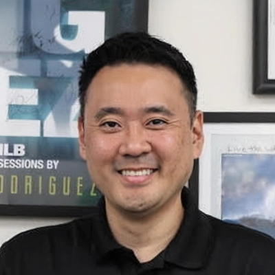 Doctor of Physical Therapy Ethan Izaki Smiling In Black Shirt