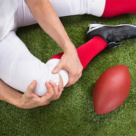 Football Player With A Sports Injury